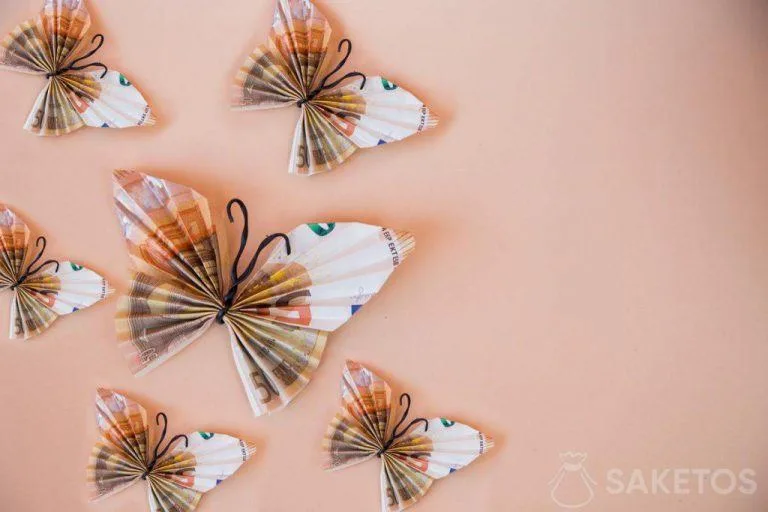 Hoe verpak je geld voor een kind? Inspirerende ideeën 14 Een heel origineel idee om geld cadeau te doen aan een kind - origami van bankbiljetten.